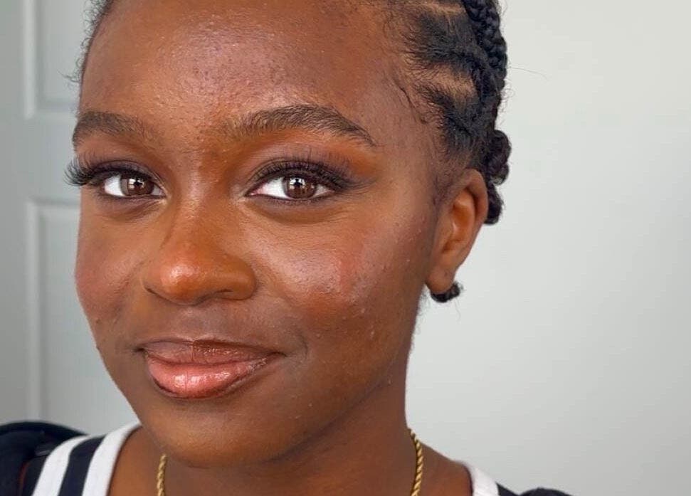 Close-up of a woman with elegant makeup at Glammed By Vic, Oshawa, Ontario, CA, showcasing natural beauty.