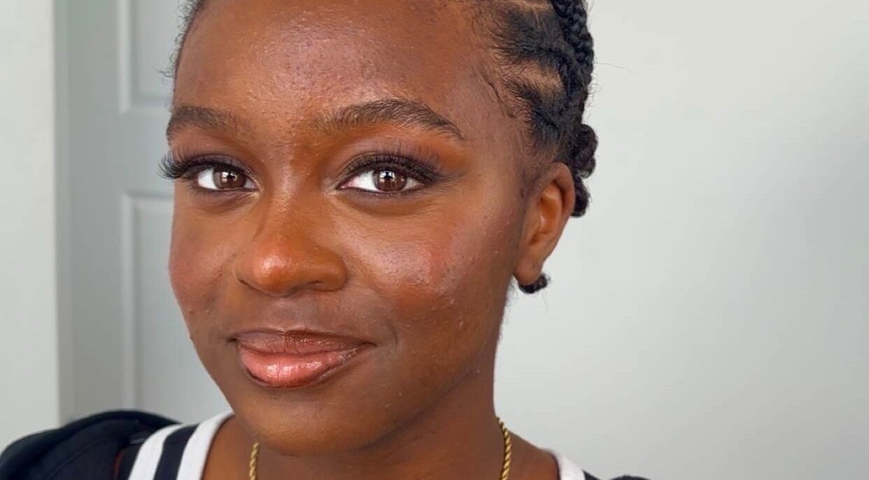 Close-up of a woman with elegant makeup at Glammed By Vic, Oshawa, Ontario, CA, showcasing natural beauty.