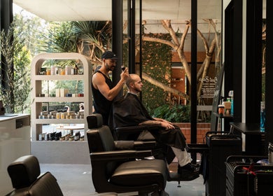 Modern haircut at Lost Boys PGA, Eagle Farm, Queensland, AU showcasing sleek interior and professional service.