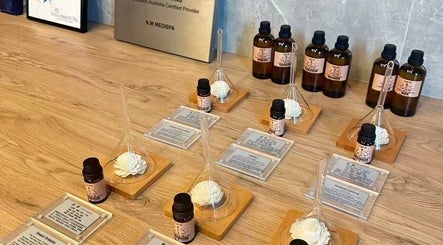 Essential oils and aroma diffusers at NM MEDSPA in Auckland, Auckland, NZ, creating a relaxing ambience.