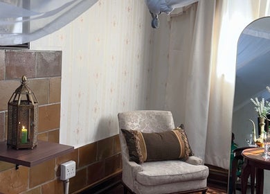 Elegant relaxation area at GBL REINE CHATEAU BEAUTY BAR, Polokwane, Limpopo, ZA, featuring chic decor.