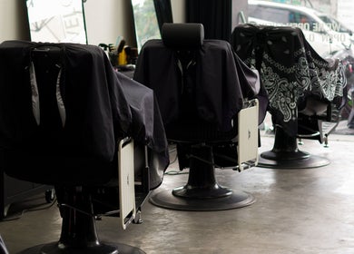 Modern barber chairs at Sae Collective Barber in Bali, Bali, ID, styled for a premium grooming experience.
