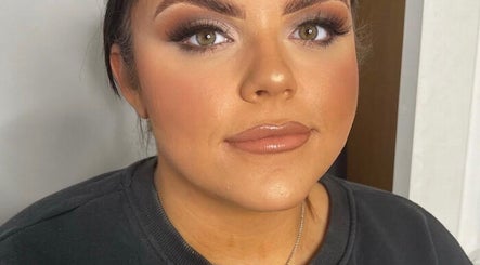 Close-up of a model with flawless makeup at ES Beauty, Aberdare, Wales, GB showcasing glamorous eye and lip style.
