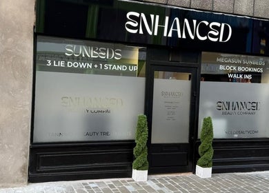 Exterior of ES Beauty in Aberdare, Wales, GB showcasing sunbed services and sleek design.
