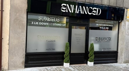 Exterior of ES Beauty in Aberdare, Wales, GB showcasing sunbed services and sleek design.