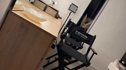 Chic makeup station at ES Beauty, Aberdare, Wales, GB, featuring stylish chairs and a large mirror.