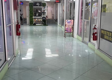Bright hallway leading to Ariacrylics in Arima, Arima Borough Corporation, TT. Inviting and well-maintained space.