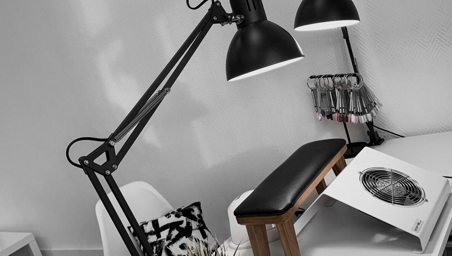 Sleek nail station with lamps and tools at AFA STUDIO, Dublin, County Dublin, IE, highlighting modern decor.