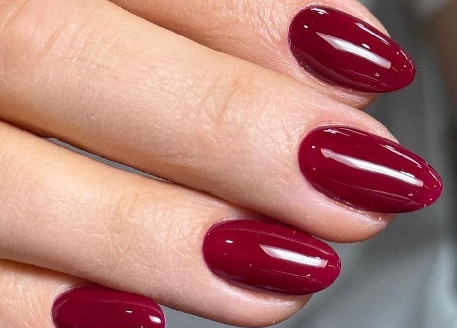 Elegant crimson nails from AFA Studio Nails & Beauty, Dublin, County Dublin, IE enhance feminine charm.