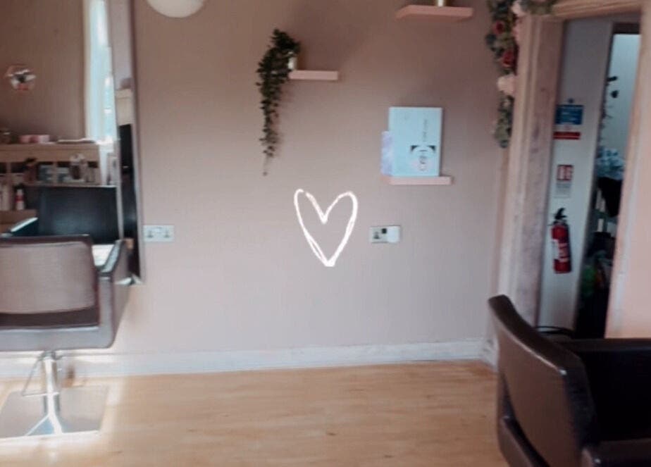 Modern salon seating at The Hideaway, Tickhill, England, GB, with mirrors and minimalist decor.