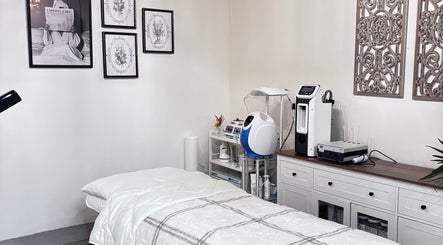 Modern treatment room at Solé Beauty Lounge, London, Ontario, CA with sleek equipment and cozy decor.