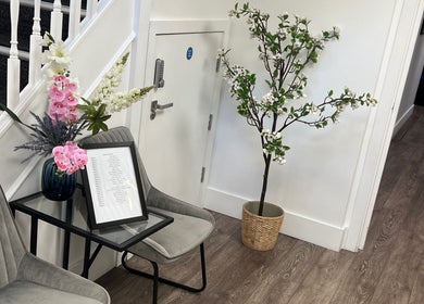 Welcoming interior at Na.Ko Hair London with elegant seating and decor, London, England, GB.