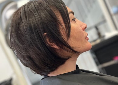 Profile view of a stylish haircut at Na.Ko Hair London, showcasing expert styling in London, England, GB.