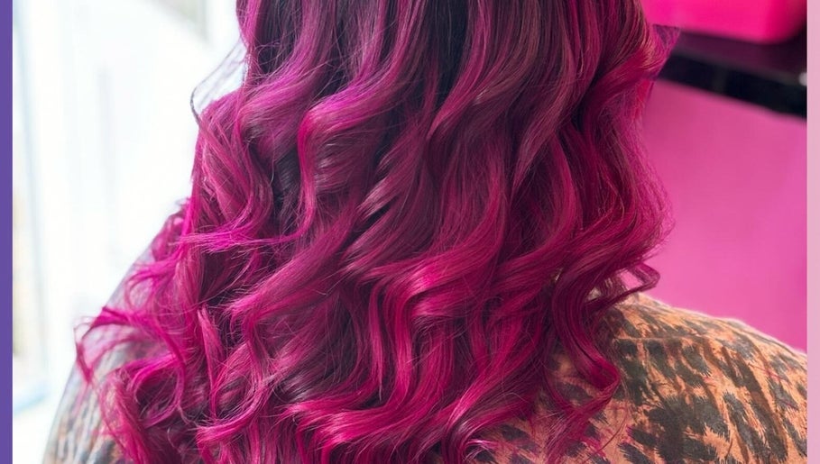 Vibrant pink curls styled at Reflectionz - Hair By Zoe, Raunds, England, GB.