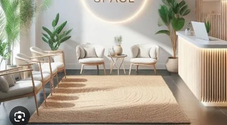 Elegant waiting area at Coco's Cosmetics, Poole, England, GB with cozy chairs and lush plants.