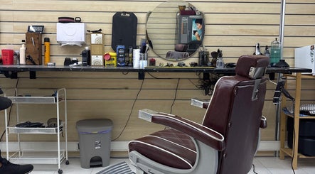 Barbershop setup at Prestígio in Ramada, Lisboa, PT. Leather chair and grooming tools evoke traditional charm.