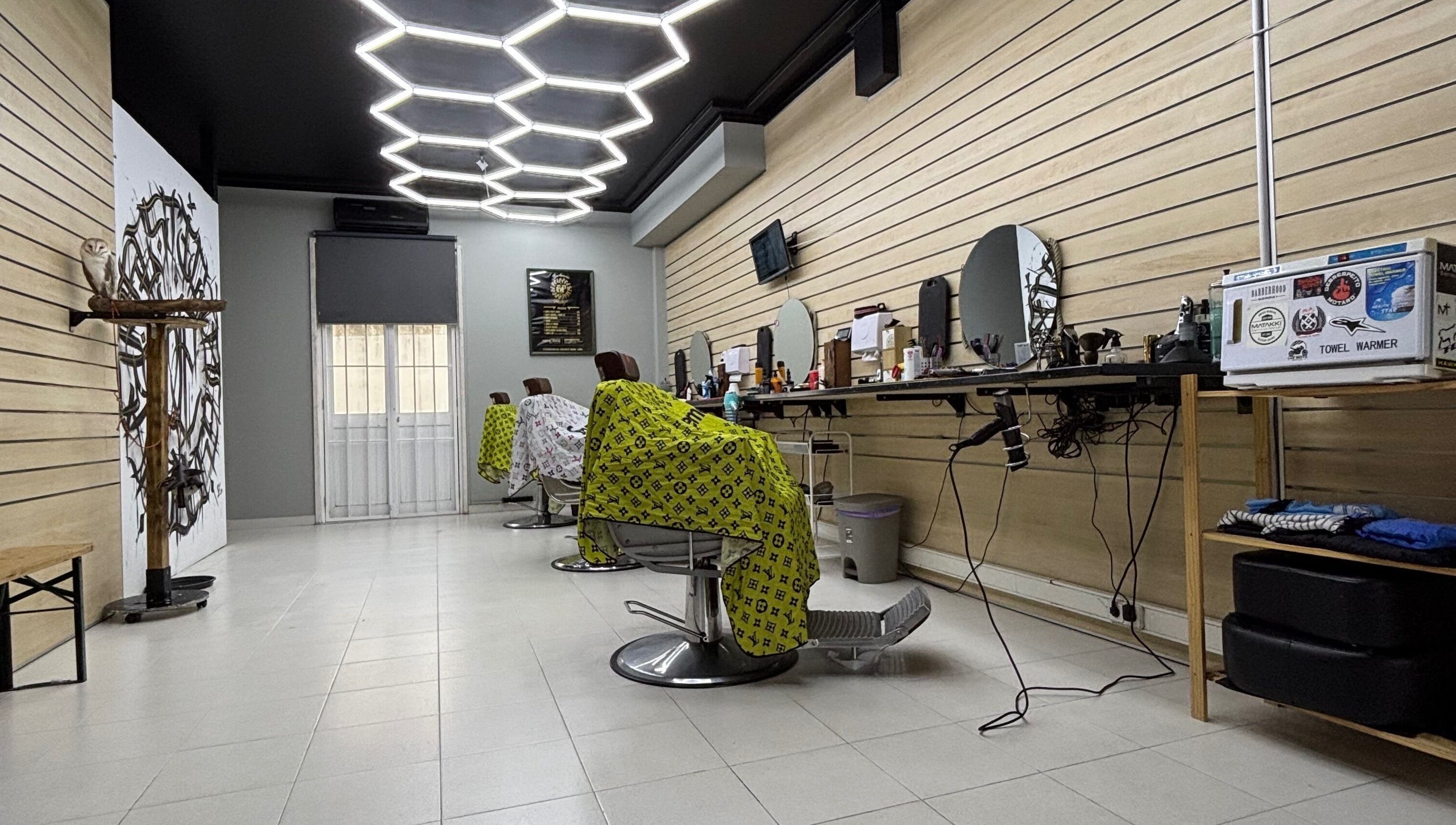 Modern salon interior at Prestígio in Ramada, Lisboa, PT with stylish decor and unique lighting.