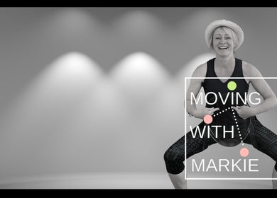 Smiling woman in exercise pose at Moving with Markie, Folkestone, England, GB.