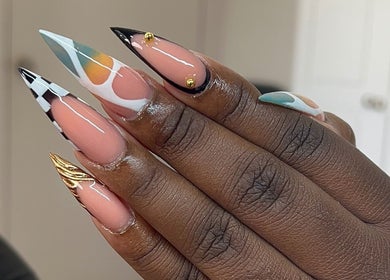 Distinctive nail art design at TheNailLab, Belvedere, SX showcases intricate patterns on manicured nails.