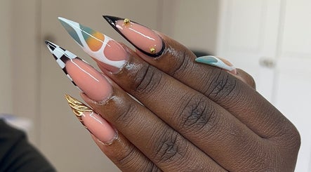 Distinctive nail art design at TheNailLab, Belvedere, SX showcases intricate patterns on manicured nails.