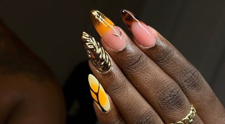 Intricate nail art design featuring gold embellishments at TheNailLab, Belvedere, SX.