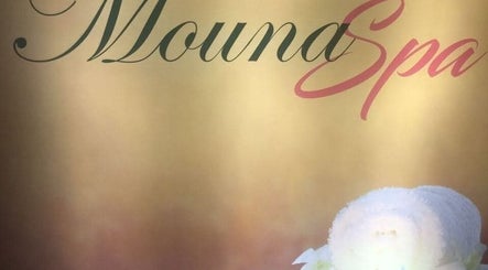 Peaceful ambiance at Mouna unisex salon and spa, Arisinakunte, Karnataka, IN with elegant decor.