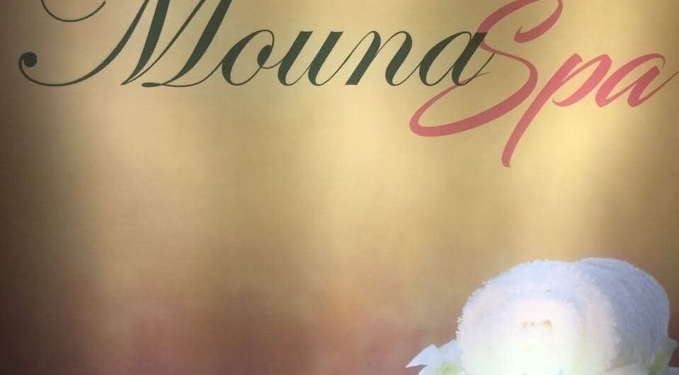 Elegant signage at Mouna Unisex Salon and Spa in Arisinakunte, Karnataka, IN, exudes serene luxury and style.