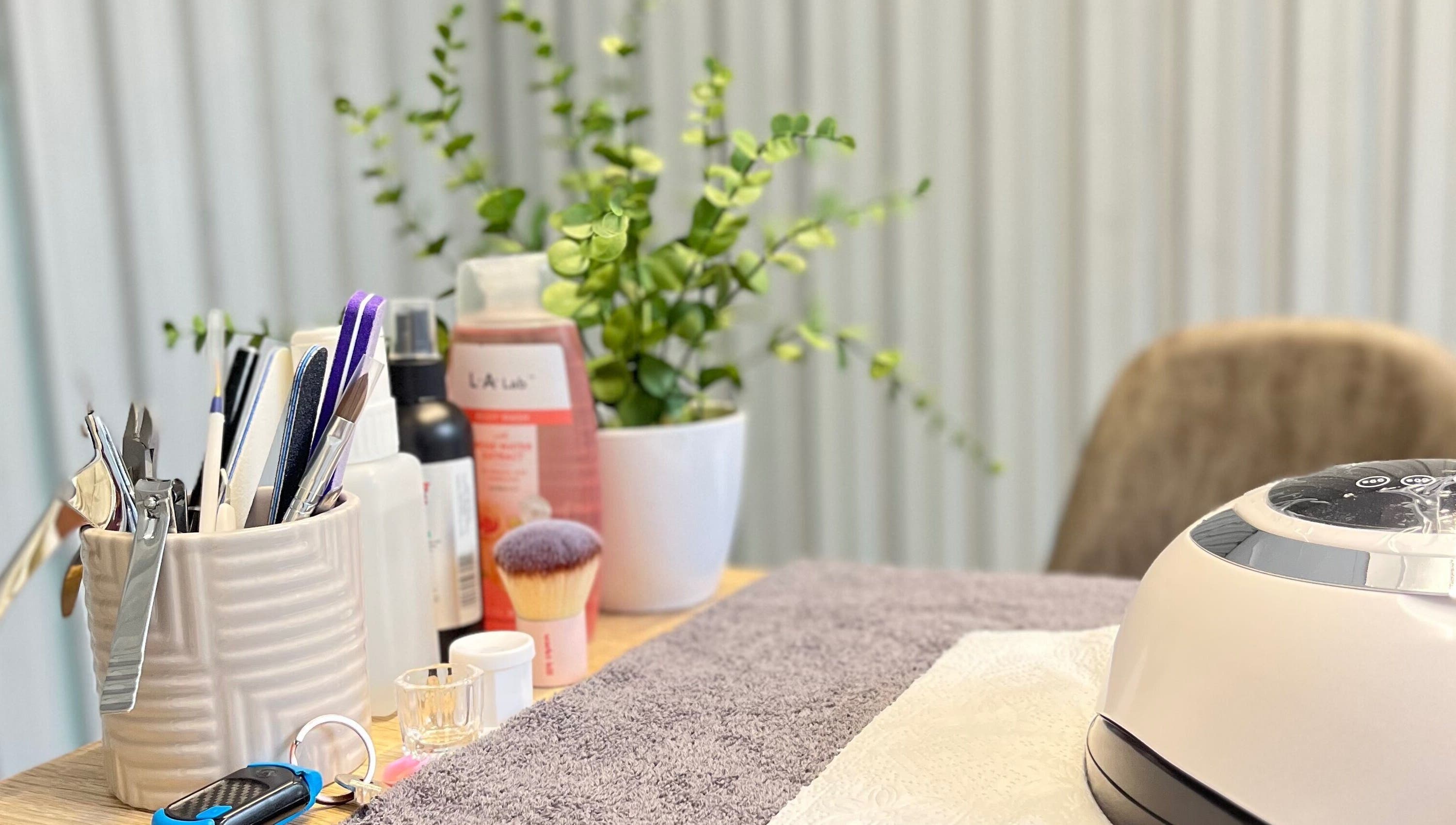 Manicure tools and decor at Essentials Lately in Harare, Harare Province, ZW, offering a relaxing spa atmosphere.