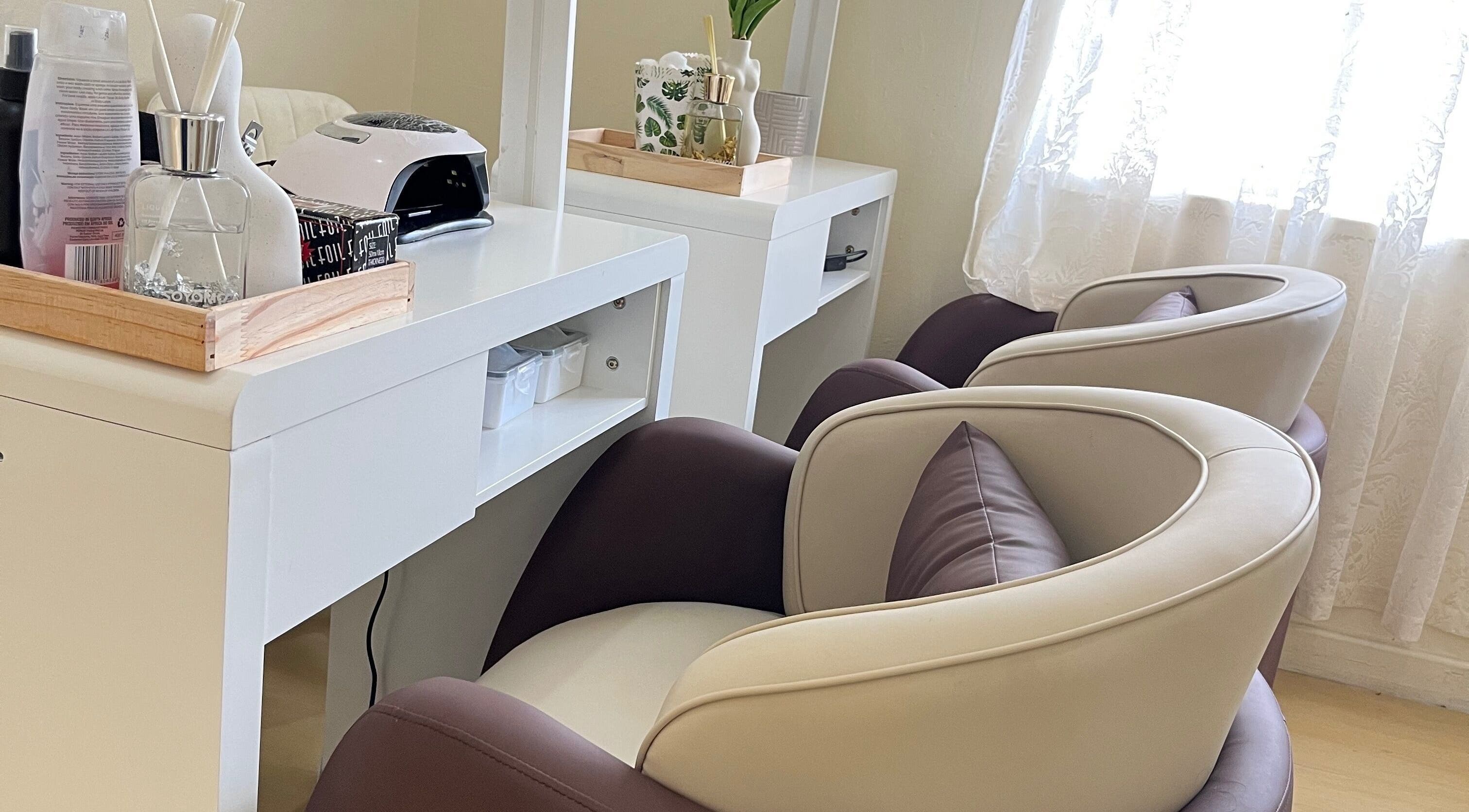 Elegant nail salon chairs at Essentials Lately, Harare, Harare Province, ZW offering premium relaxation.