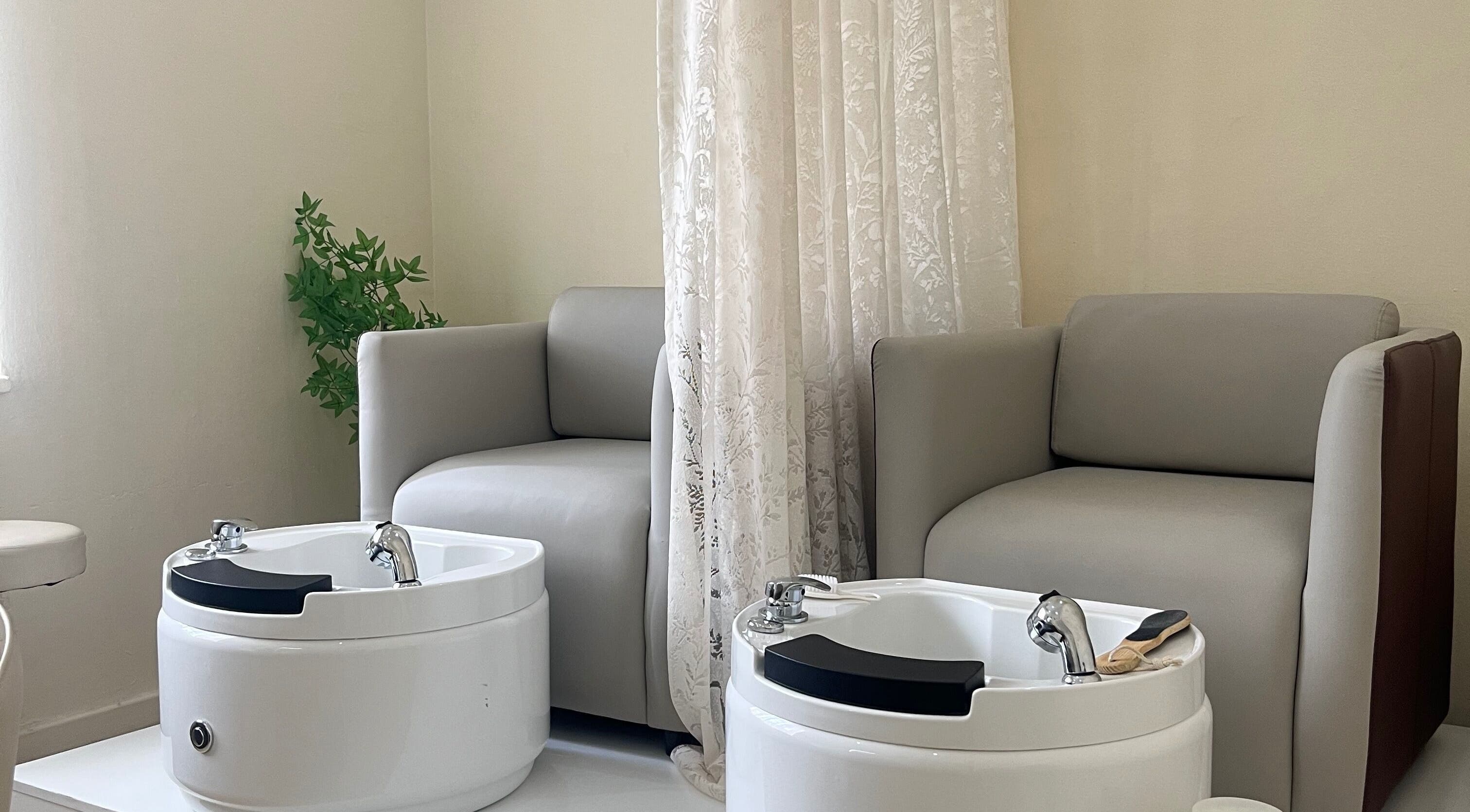 Relaxing pedicure chairs in elegant setting at Essentials Lately, Harare, Harare Province, ZW.
