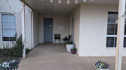 Charming entrance of Better Day Massage in Oakey, Queensland, AU with inviting seating and flowers.