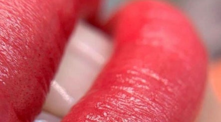 Close-up of vibrant red lips from The Beauty By Nina, Dublin, County Dublin, IE.