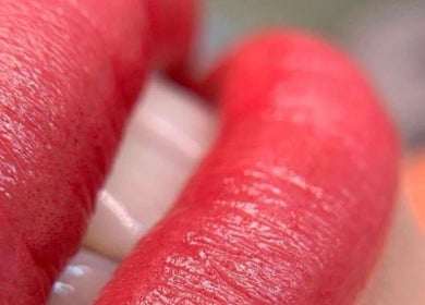 Close-up of vibrant red lips from The Beauty By Nina, Dublin, County Dublin, IE.