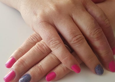Vibrant pink and glitter nails manicure at Pampered Beauty Room, Cowdenbeath, Scotland, GB.