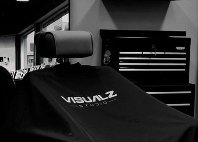 Interior do Visualz Studio - Barbershop em Alverca Do Ribatejo, Lisboa, PT com cadeira de cabeleireiro.