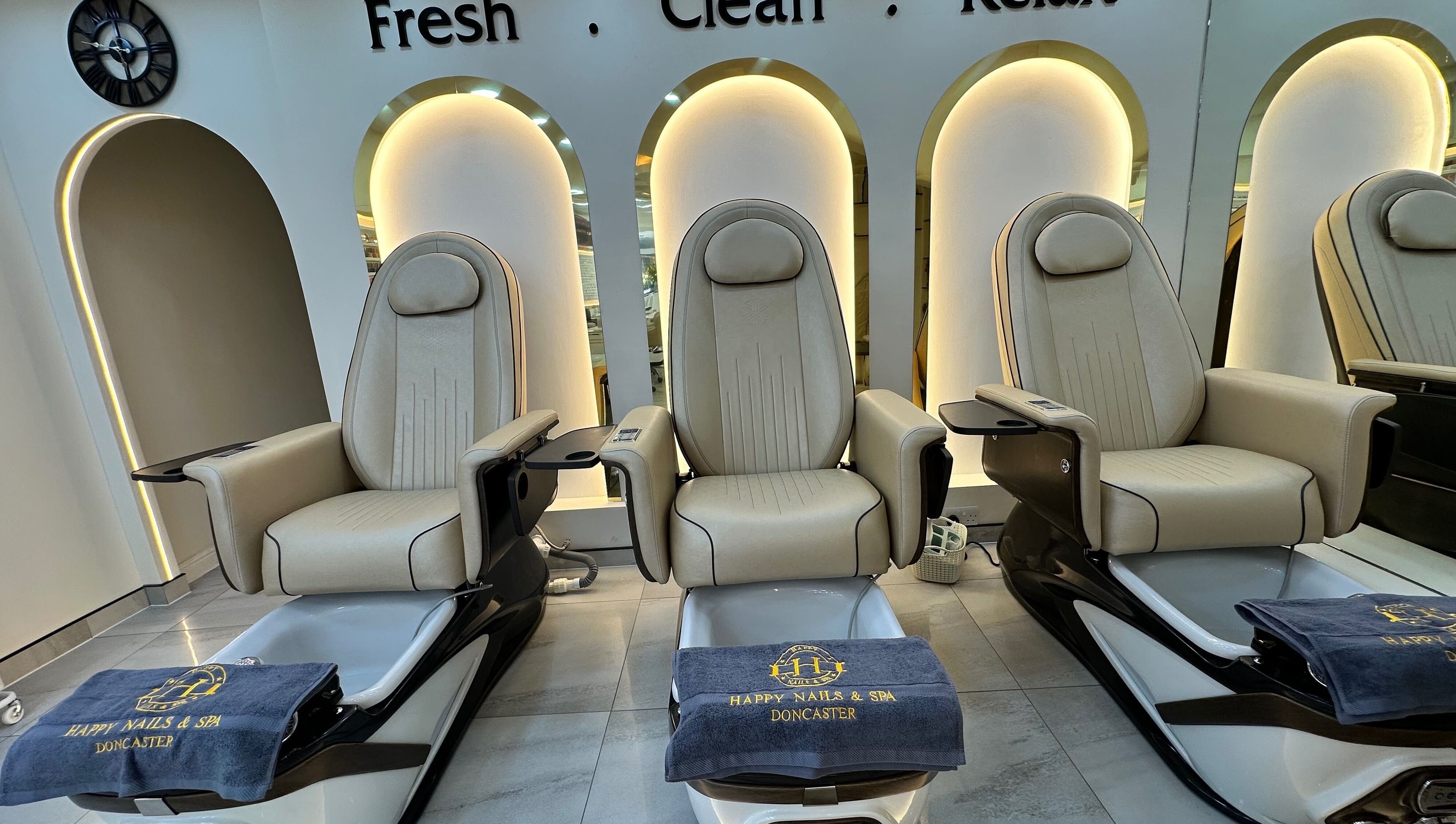 Comfortable pedicure chairs at Happy Nails Doncaster, Doncaster, England, GB, offering relaxing beauty services.