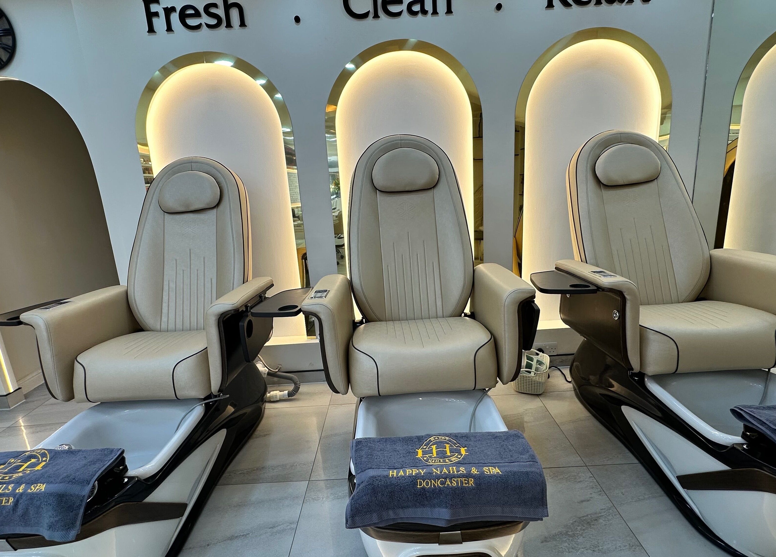 Comfortable pedicure chairs at Happy Nails Doncaster, Doncaster, England, GB, offering relaxing beauty services.
