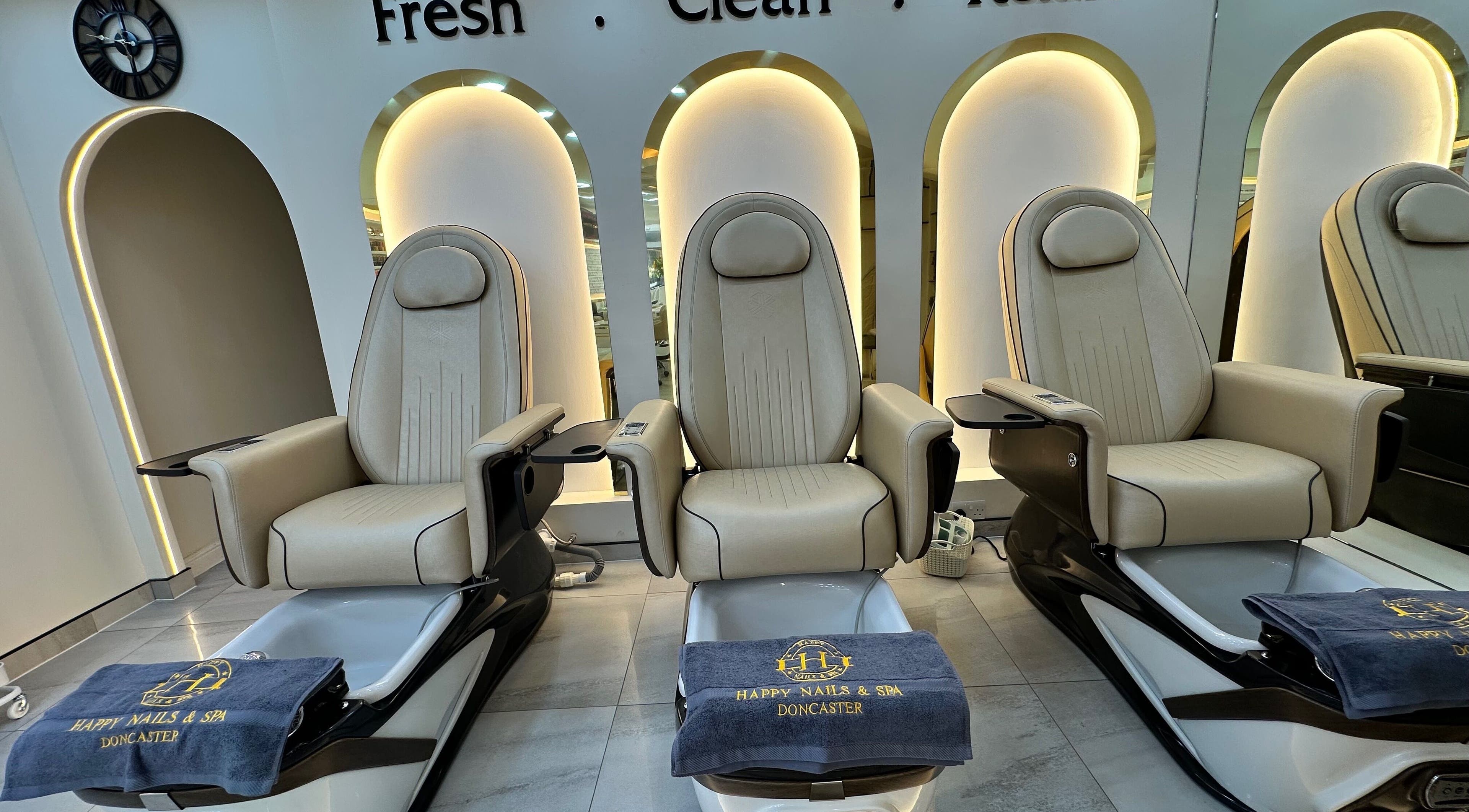 Comfortable pedicure chairs at Happy Nails Doncaster, Doncaster, England, GB, offering relaxing beauty services.