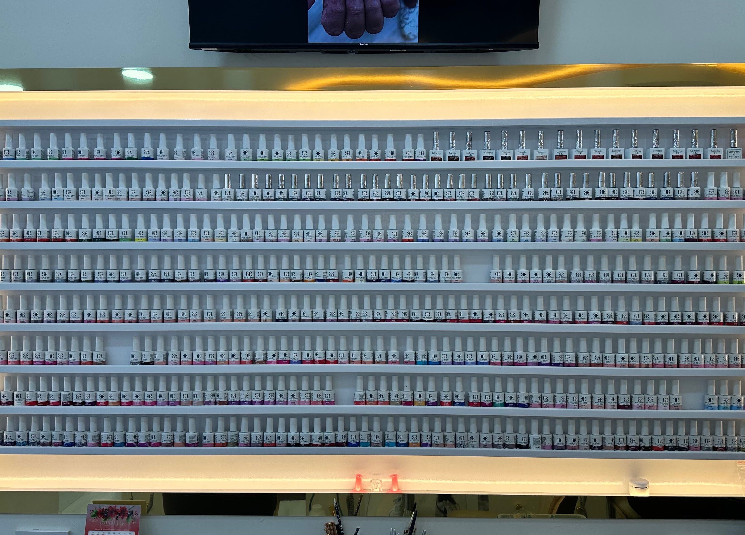 Nail polish display at Happy Nails Doncaster, showcasing a vibrant range in Doncaster, England, GB.