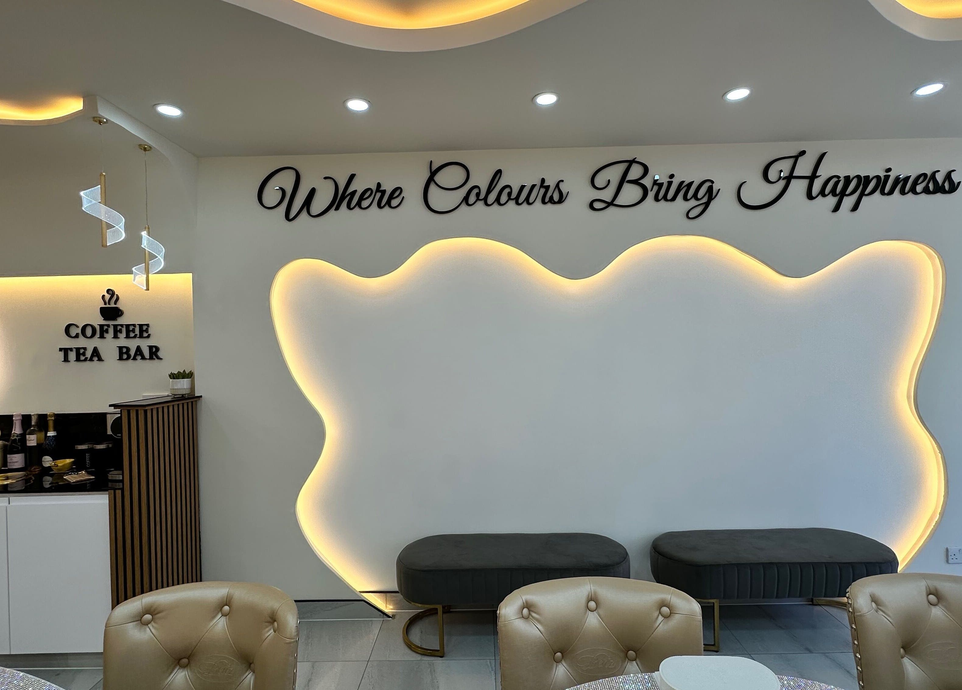Elegant lounge at Happy Nails Doncaster, England, GB featuring cozy seating and ambient lighting.