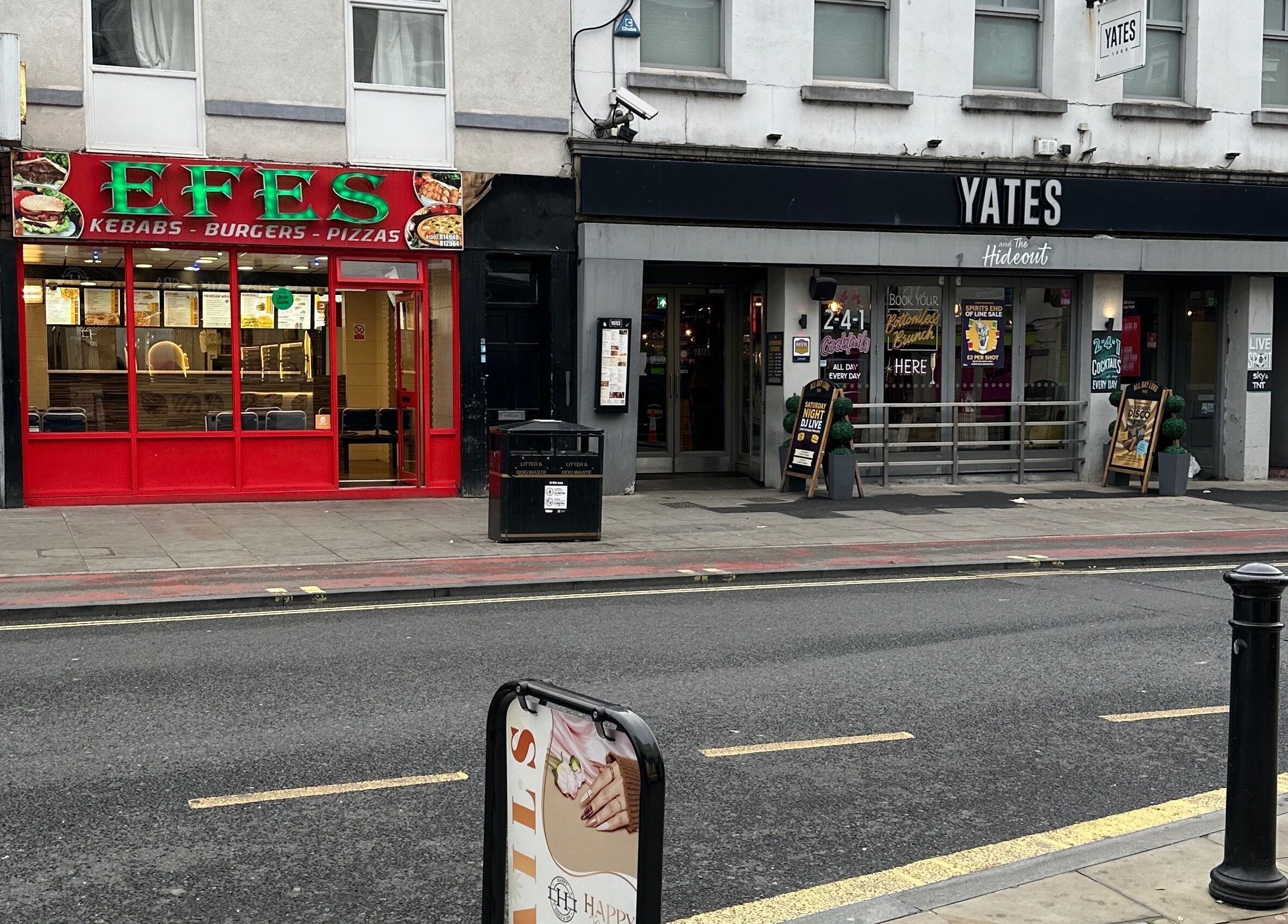 Street view of Happy Nails Doncaster, situated in Doncaster, England, GB, showcasing nearby buildings.