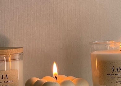 Vanilla candles lit creating a warm glow at Olivia Skin and Beauty, Worcester, England, GB.
