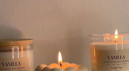 Vanilla candles lit creating a warm glow at Olivia Skin and Beauty, Worcester, England, GB.