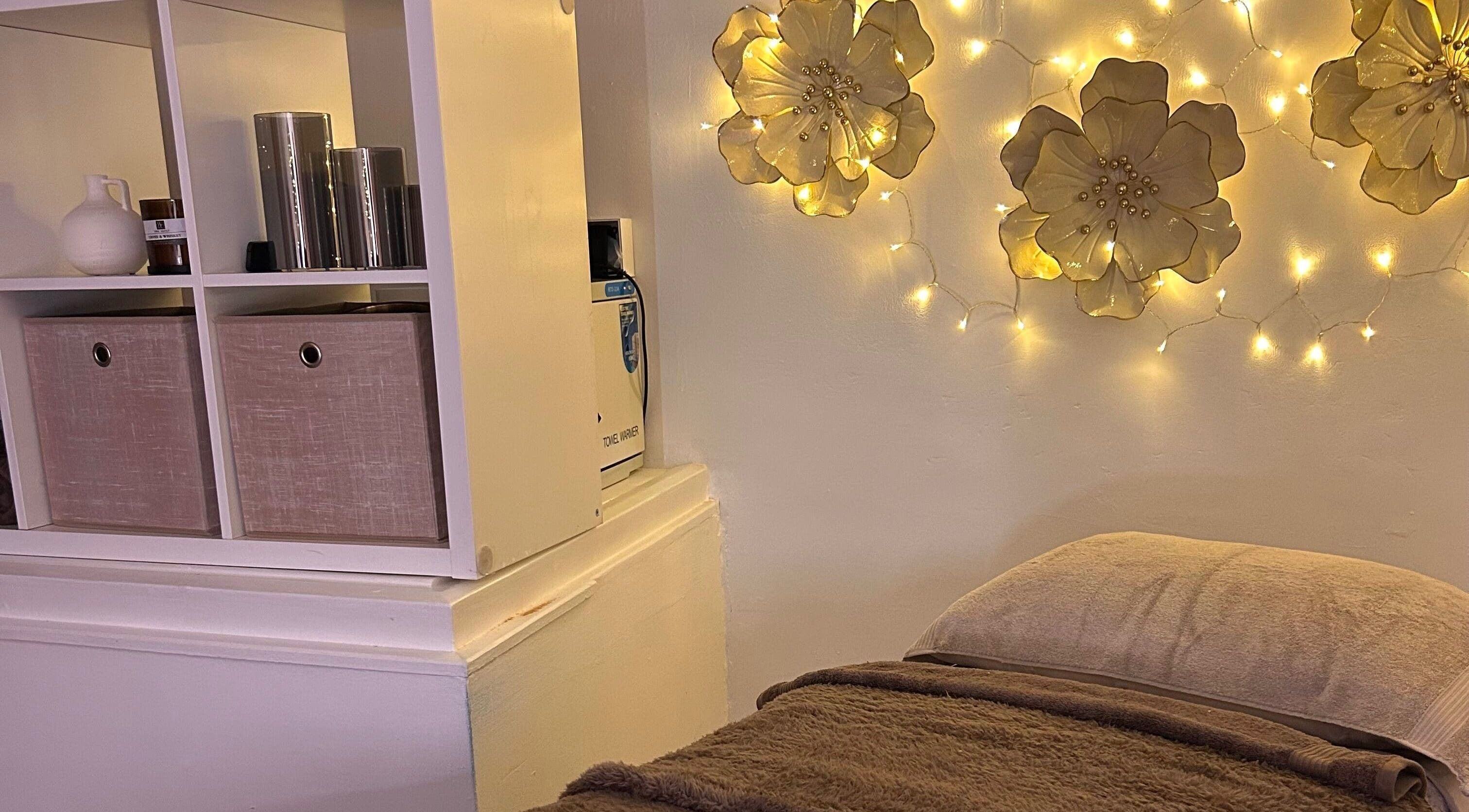 Elegant spa room with warm lighting at Olivia Skin And Beauty Worcester, England, GB, enhancing relaxation.