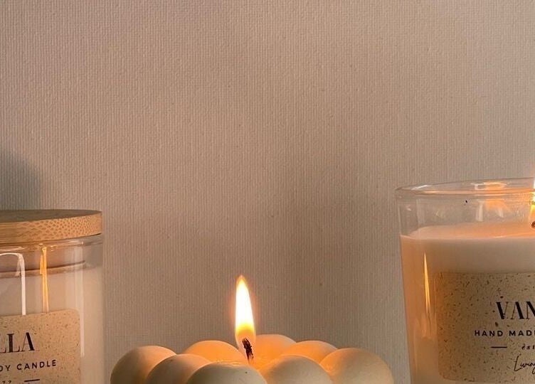 Luxury vanilla candles creating a serene ambiance at Olivia Skin And Beauty, Worcester, England, GB.