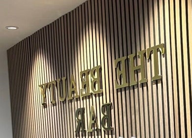 Interior wall design at Skin Plus, Burgh Le Marsh, England, GB highlighting modern beauty ambiance.