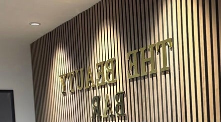 Interior wall design at Skin Plus, Burgh Le Marsh, England, GB highlighting modern beauty ambiance.