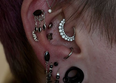 Stylish ear piercings with silver and black jewelry at Houzeofpiercing, Dublin, County Dublin, IE.