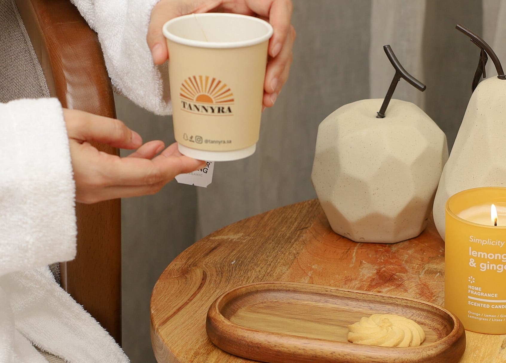 Relaxing coffee and candle ambiance at Tannyra, Riyadh, Riyadh Province, SA, enhancing wellness experience.