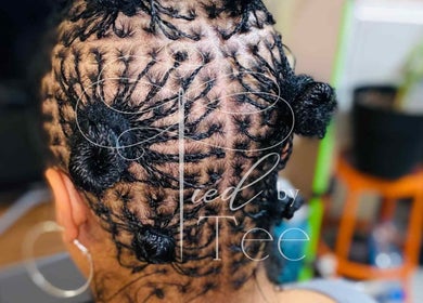 Intricate braid hairstyle at Tied By Tee, Macon, Georgia, US, showcasing expert craftsmanship.